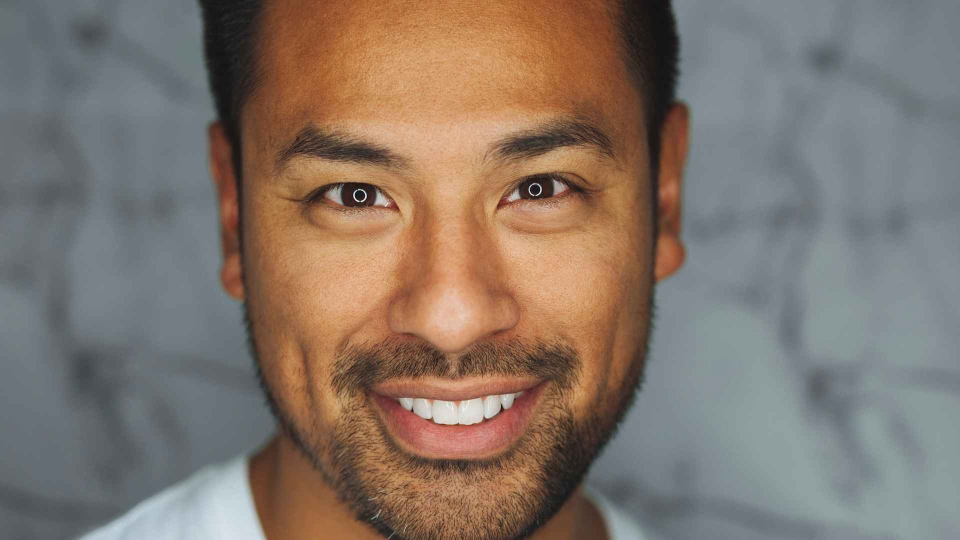 Smiling person feeling confident and at ease about their health